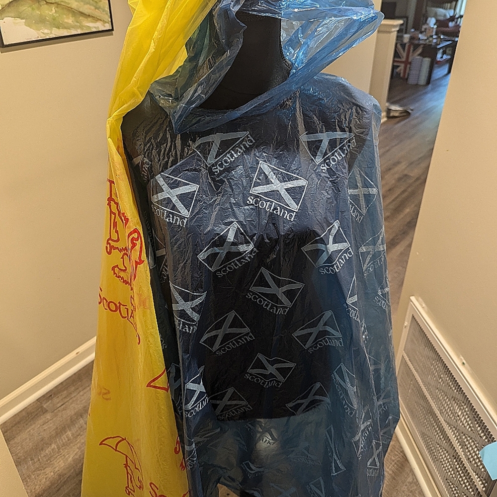 2 Scotland ponchos (leaving shop)